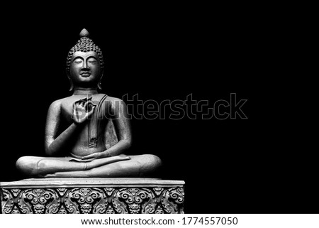 Buddha statue from Thailand.isolated on black background,symbol of religion buddhism.design with copy space add text Royalty-Free Stock Photo #1774557050