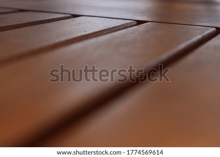the surface of the wooden ginger lime table
