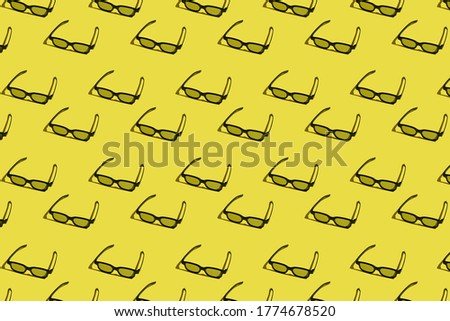 pattern with 3d eyepiece on a yellow background
