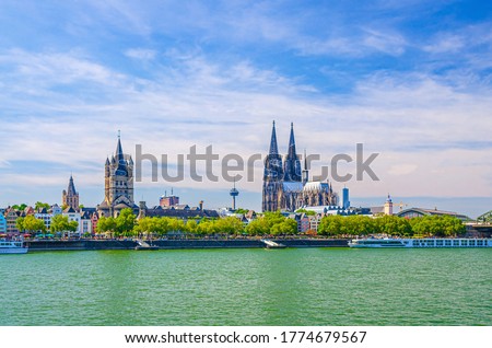 Cologne cityscape of historical city centre with Cologne Cathedral of Saint Peter, Great Saint Martin Roman Catholic Church buildings and embankment of Rhine river, North Rhine-Westphalia, Germany Royalty-Free Stock Photo #1774679567