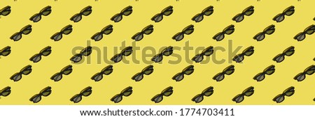 pattern with 3d eyepiece on a yellow background