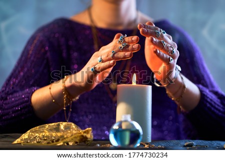 Fortune teller woman using burning candle flame for spell, witchcraft, divination and fortune telling. Spiritual esoteric occult magic ritual illustration Royalty-Free Stock Photo #1774730234