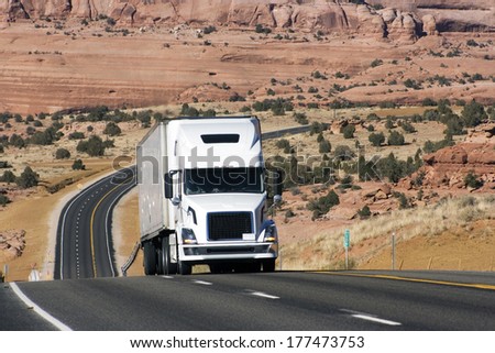 Semi truck on difficult road in Utah, USA Royalty-Free Stock Photo #177473753