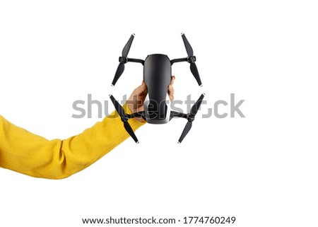 drone in hand, isolated on a white background