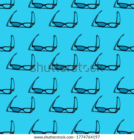 pattern with 3d eyepiece in which to watch a movie on a blue background. 