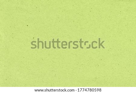 Green recycled paper background and texture.
