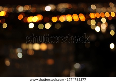 Bright bokeh effect. Defocused Image of Illuminated city.