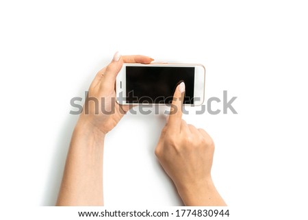 Screen hand. Cellphone, phone with space for text. Woman holding smartphone in female hand with empty blank screen isolated on white background. Learning online concept.