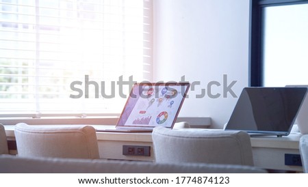 Empty meeting room. Laptop PCs in the office. Royalty-Free Stock Photo #1774874123