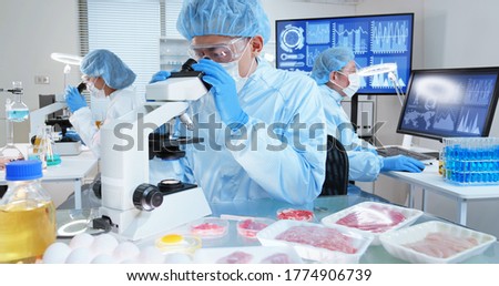 asian science team in food laboratory with meat samples Royalty-Free Stock Photo #1774906739