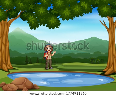 Scout girl rest near the small pond