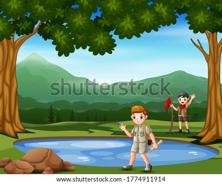 Scout boys hiking in the nature