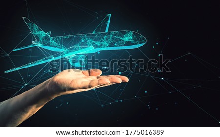 Hand holding abstract polygonal airplane on black background. AI and teamwork concept. Mock up