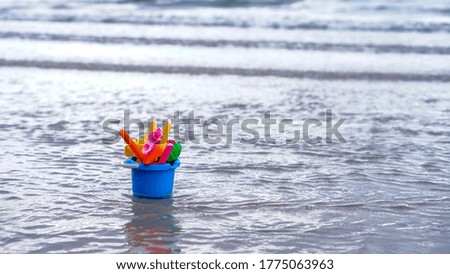 Seaside children's toys on the beach.selective focus and background