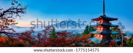 Asian Travel Destinations. Amazing Fuji Mountain With Chureito Pagoda During Fall Season, Fujiyoshida in Japan.Panoramic Image Composition Royalty-Free Stock Photo #1775154575
