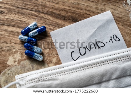 Coronavirus Medicines, white and blue pills