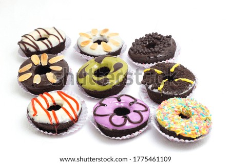 Colorful Brownies Donuts Set Isolated on White. Different type of donuts