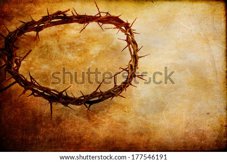 Christian crown of thorns like Christ wore over textured background with copy space.