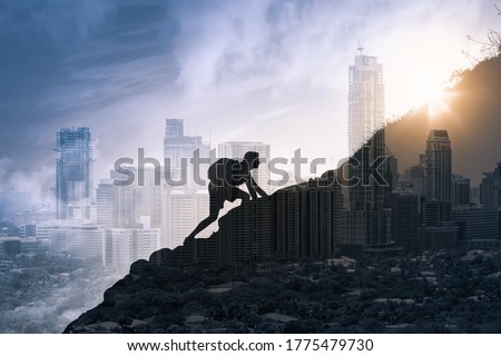 Man climbing up mountain. People goal setting and never giving up. Double exposure Royalty-Free Stock Photo #1775479730