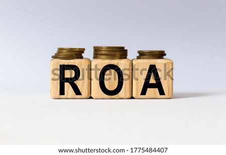 cubes with the word ROA on them. Care concept.