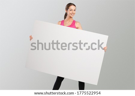 Woman hand holding white blank paper