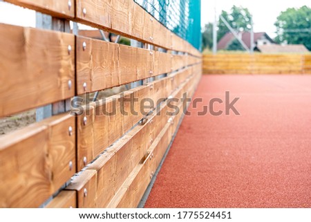 new sports fields and quality wooden guardrails for basketball and volleyball football