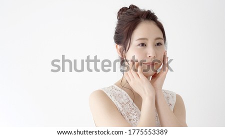 Beautiful asian young woman on white background