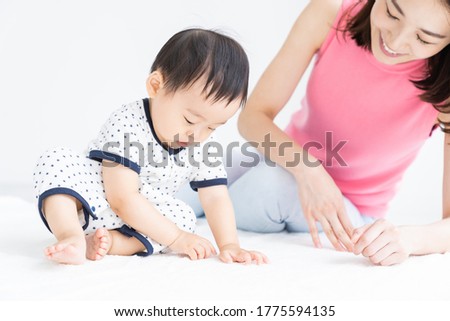 young asian mother and baby,blocks,