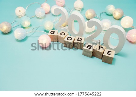 Goodbye 2020 alphabet letters with space copy on blue background Royalty-Free Stock Photo #1775645222