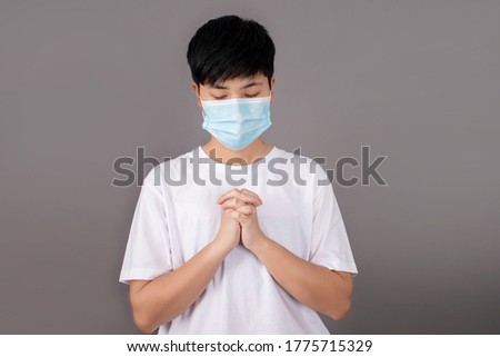 Asian people wear anti-virus masks for protection from the corona-19 virus. He are blessings from God.