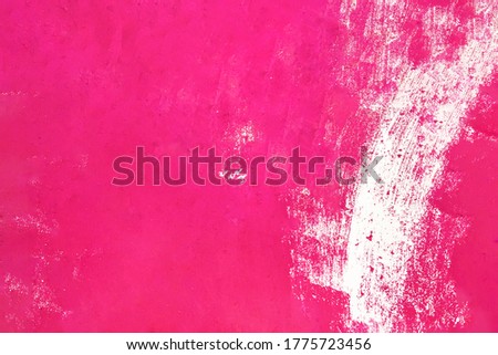 Pink painted grunge texture. Fuchsia painted wall paper texture background. 