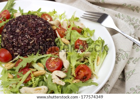Wild rice and chicken arugula salad
