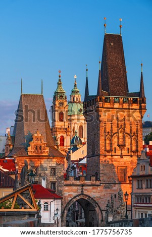 Scenic view Charles bridge and historical center with Prague castle and Hradcany, buildings and landmarks of old town at sunset, Prague, Czech Republic
