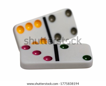 Dominoes, domino pieces in air isolated on white background with clipping path