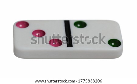 Domino piece in air isolated on white background with clipping path