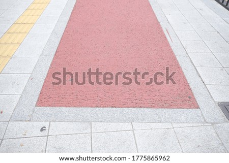 a bicycle path over the sidewalk