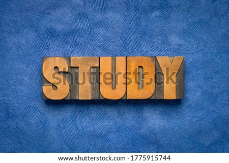study word abstract in vintage letterpress wood type, education, business and science concept