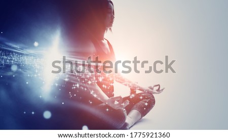 Mindfulness meditation concept. Meditating young woman. Yoga. Concentration. Royalty-Free Stock Photo #1775921360