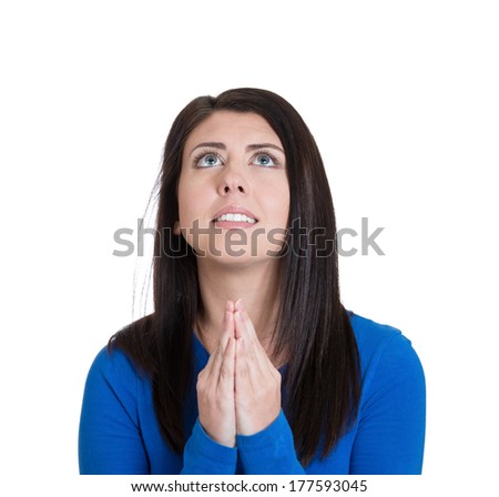 Closeup portrait of sad, troubled young woman who prays, hopes, asks begs for best, going through tough times in her life, isolated on white background. Positive emotions, facial expressions, feeling