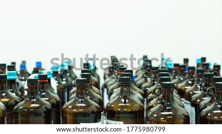Group of bottles contain chemical hazardous waste in quarantine area and waiting disposal, concept of chemical waste management and environment concern for chemical waste contamination Royalty-Free Stock Photo #1775980799