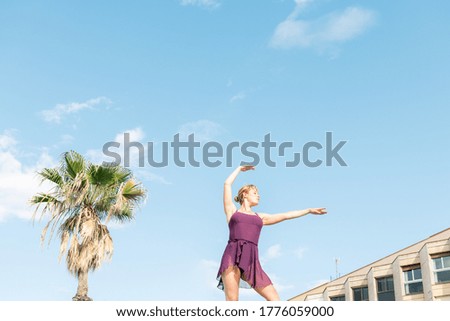 young caucasian classic dancer dancing free in the city, dance and freedom concept, copy space for text