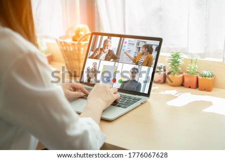 Video call group of business people meeting on virtual workplace or remote office.Remote work,virtual meeting and Online Video Conference Interview Call concept.Manager talking online with coworkers
