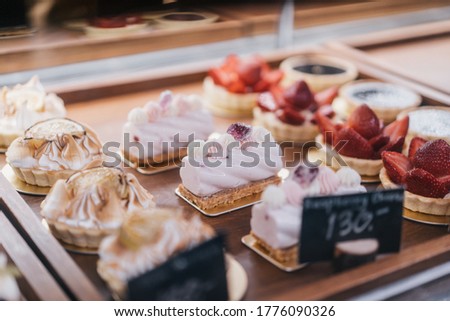 Cake and tart in show case Royalty-Free Stock Photo #1776090326