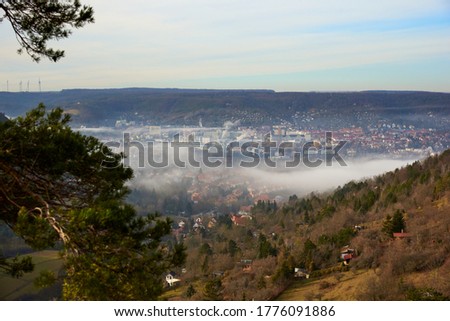 view from the mountain to the misty city