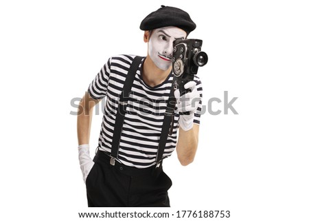 Mime recording with a vintage camera isolated on white background
