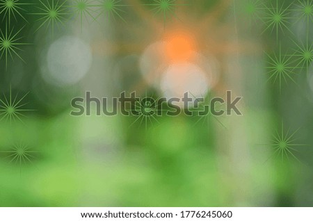 Abstract background of golden bokeh on a green background