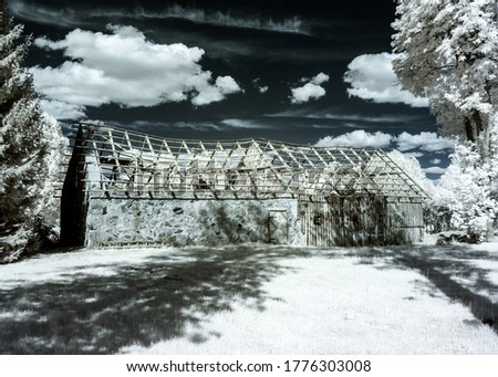 mystical summer landscape with houses and trees, infrared photography. our beautiful world in the spectrum of infrared camera