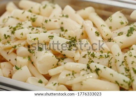 crisp black salsify at a lunch buffet Royalty-Free Stock Photo #1776333023