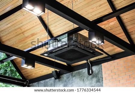 Ceiling mounted cassette type air conditioner ducted. Royalty-Free Stock Photo #1776334544