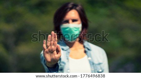 Beautiful woman wearing medical mask outdoor